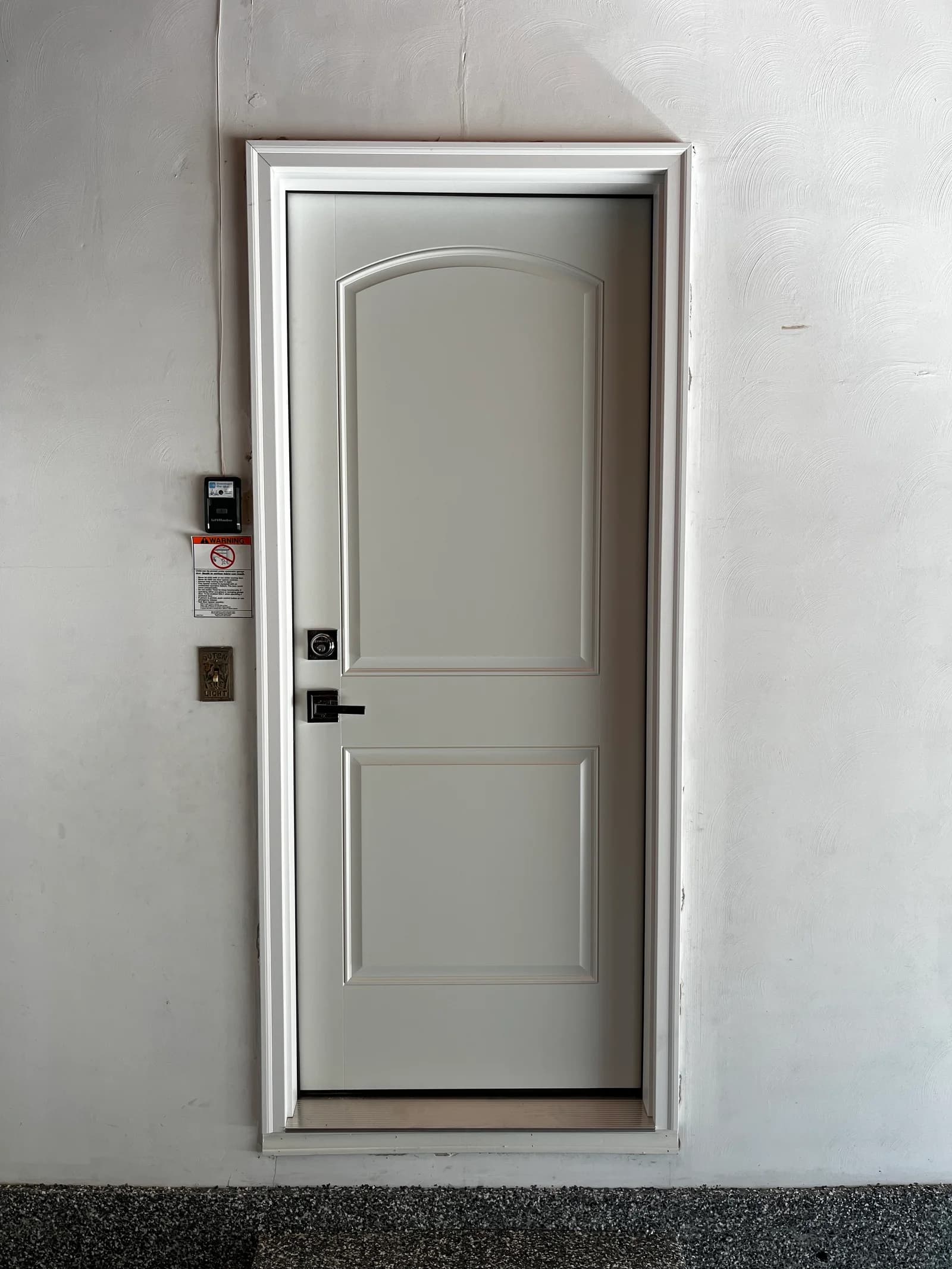 New white entry door after replacement in Kalamazoo